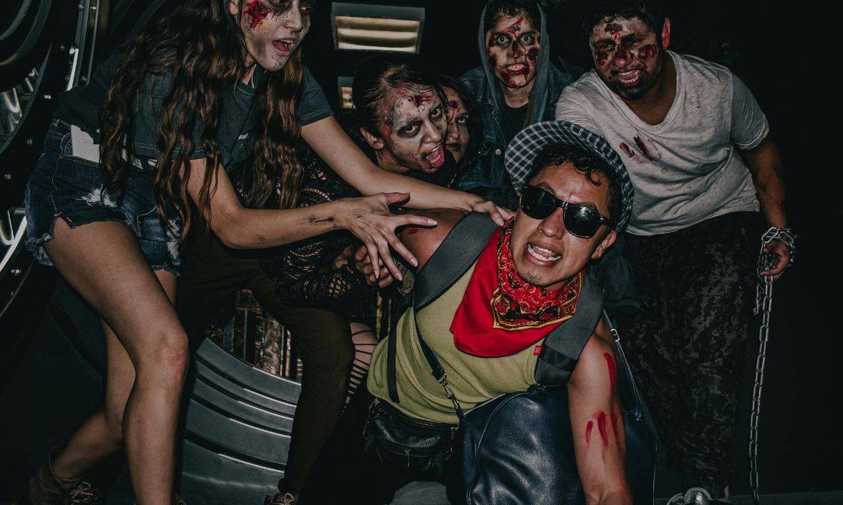 Crowd in zombie costumes at a music festival