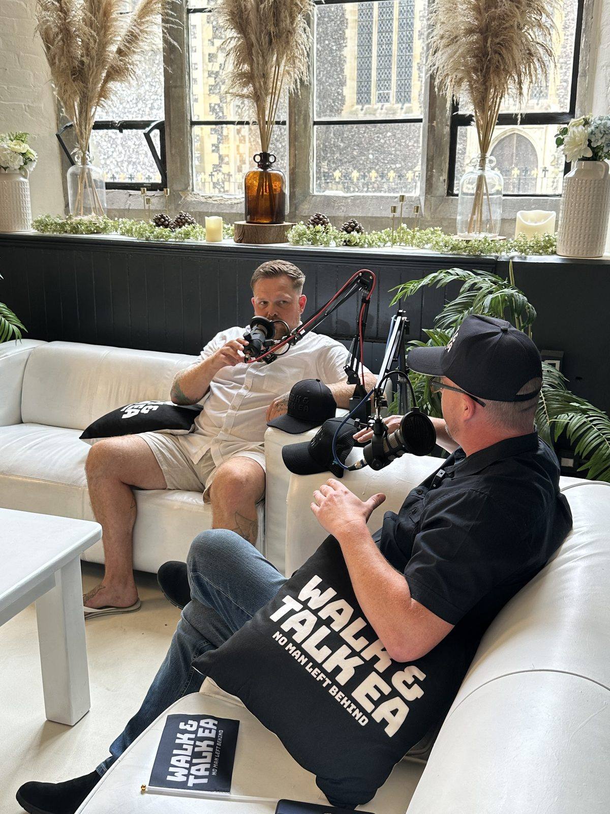 Ice Bath Harry and guest on the podcast sofas, audience watching, Mental Wealth 2026